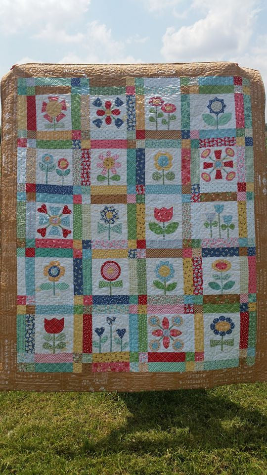 Finally got my beautiful Bloom Quilt by Lori Holt quilted!