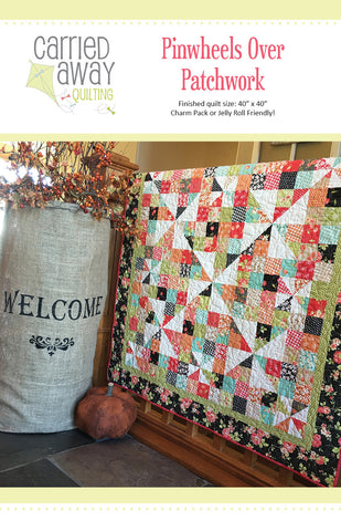 Pinwheels Over Patchwork Quilt Pattern by Taunja Kelvington of Carried Away Quilting