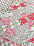 Crossing Petals Mini Quilt Pattern by Taunja Kelvington of Carried Away Quilting
