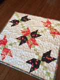 Crossing Petals Mini Quilt Pattern by Taunja Kelvington of Carried Away Quilting
