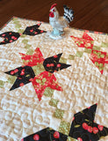 Crossing Petals Mini Quilt Pattern by Taunja Kelvington of Carried Away Quilting